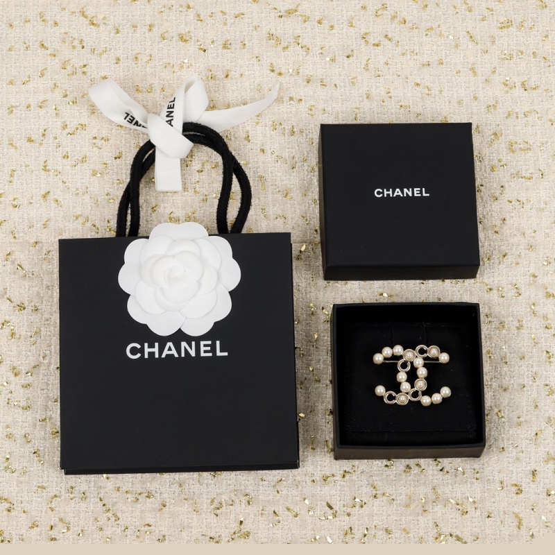 Ch*el brooches